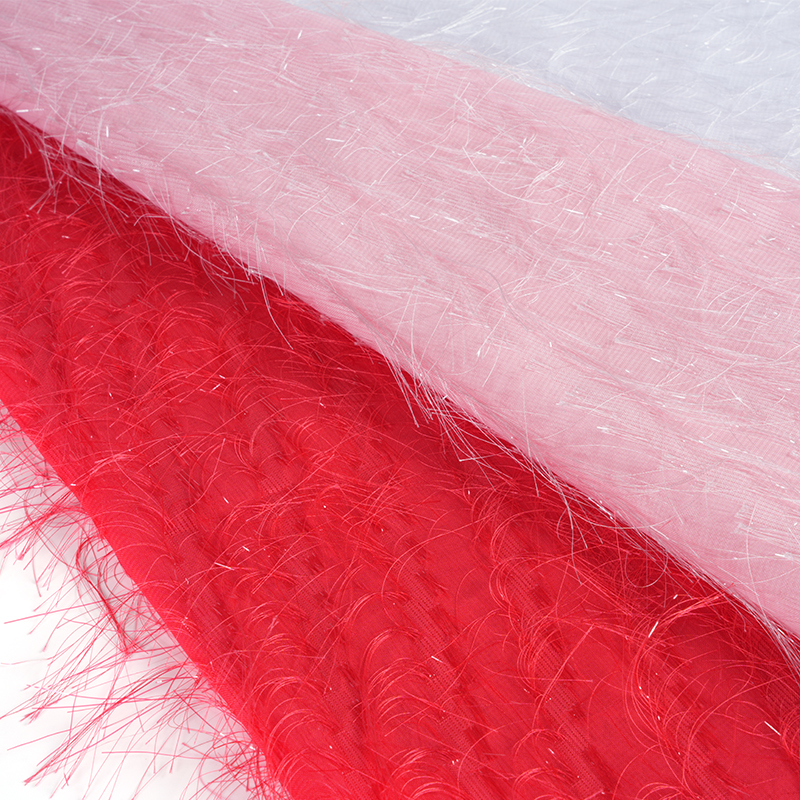 Tela Uragiri con flores cortadas y borlas de lentejuelas 75D