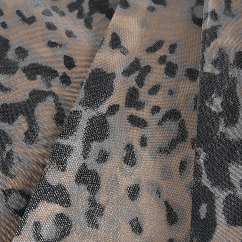 Tela con estampado de leopardo pequeño de algodón dorado engrosado 20d*21s