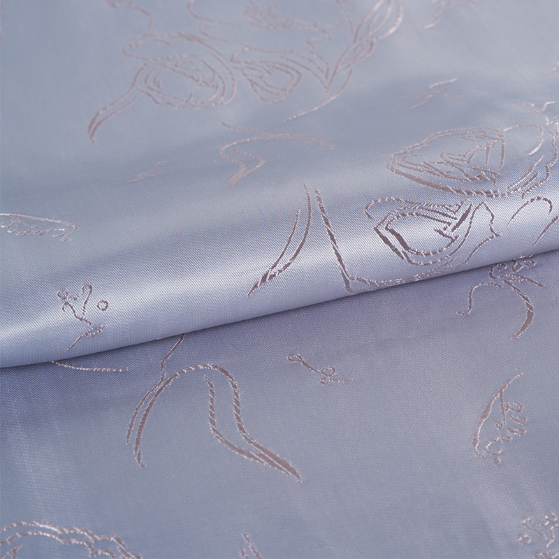 Jacquard con elemento floral PV