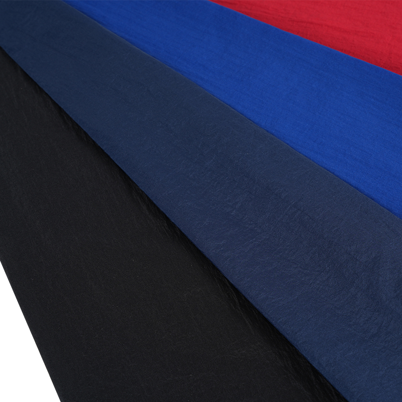 Tejido de teñido giratorio de nailon de baja elasticidad semimate 400T